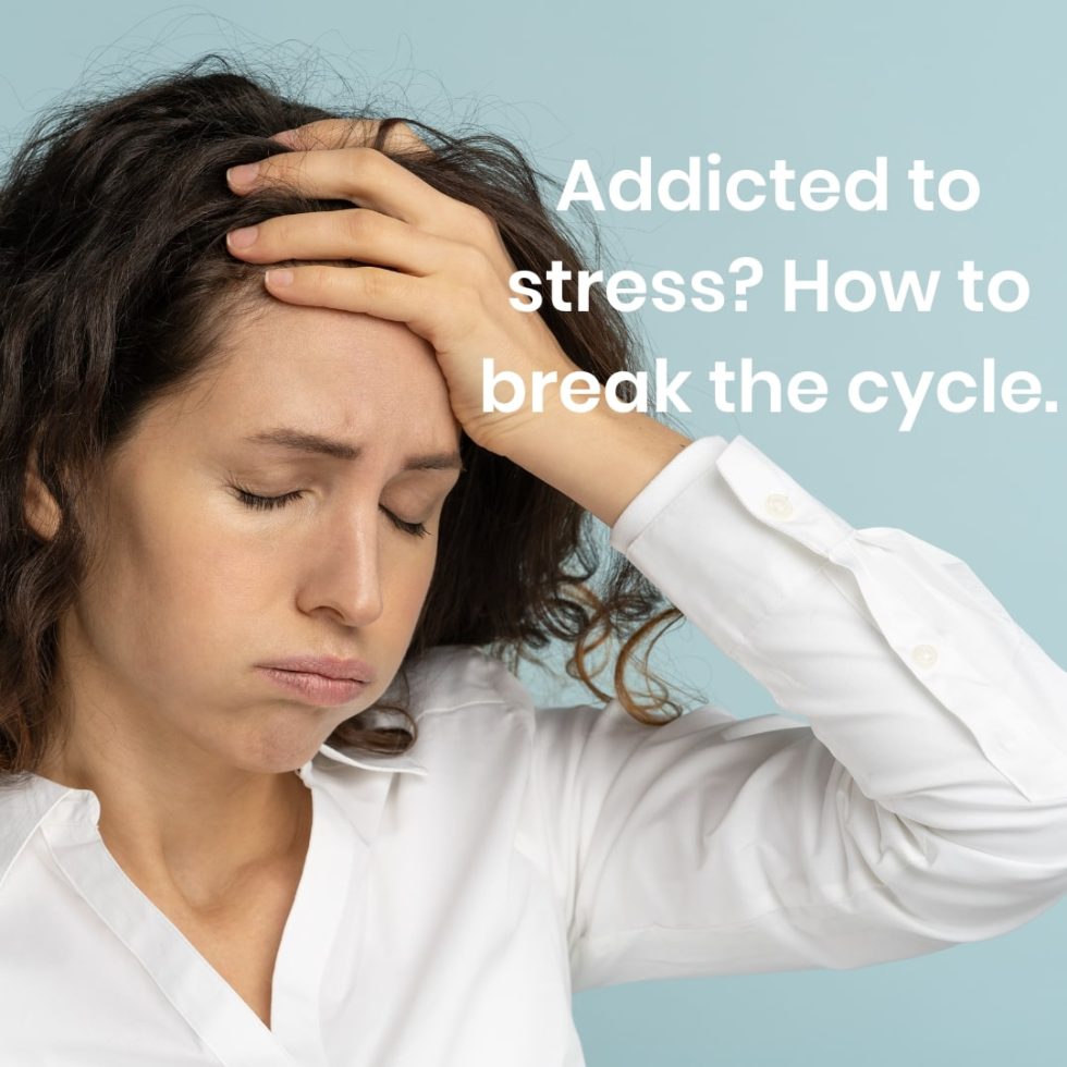 A lady with her eyes closed and her hand on her forehead to reflect a stressed mood